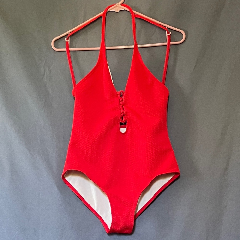 Bright red subtly, sexy one-piece swimsuit